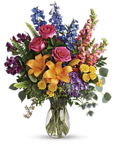 <div id="mark-3" class="m-pdp-tabs-marketing-description">A rainbow of beauty for any occasion. Purple hydrangea, pink roses and orange lilies positively pop in this bright bouquet, featuring all the colors of the rainbow.</div>
<div id="desc-3">
<ul>
<li>This colorful bouquet includes purple hydrangea, pink roses, yellow spray roses, orange asiatic lilies, purple alstroemeria, blue delphinium, pink snapdragons, blue eryngium, huckleberry, oregonia, Israeli ruscus, sword fern, silver dollar eucalyptus, seeded eucalyptus, and lemon leaf.</li>
</ul>
</div>